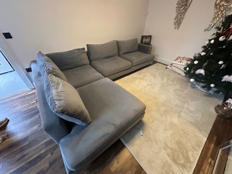Large grey designer corner sofa 