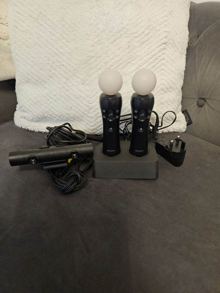 2 x playstation move controllers, stand and camera 