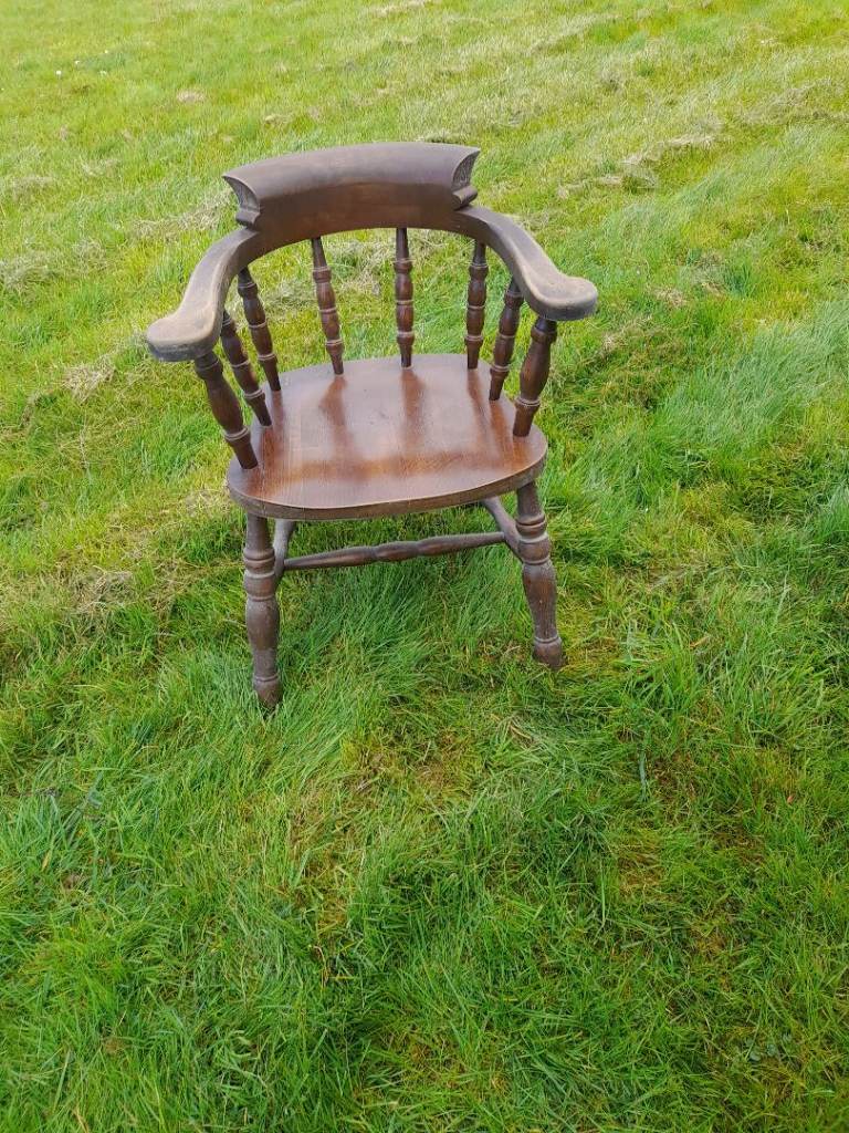 Antique wooden captain's chair