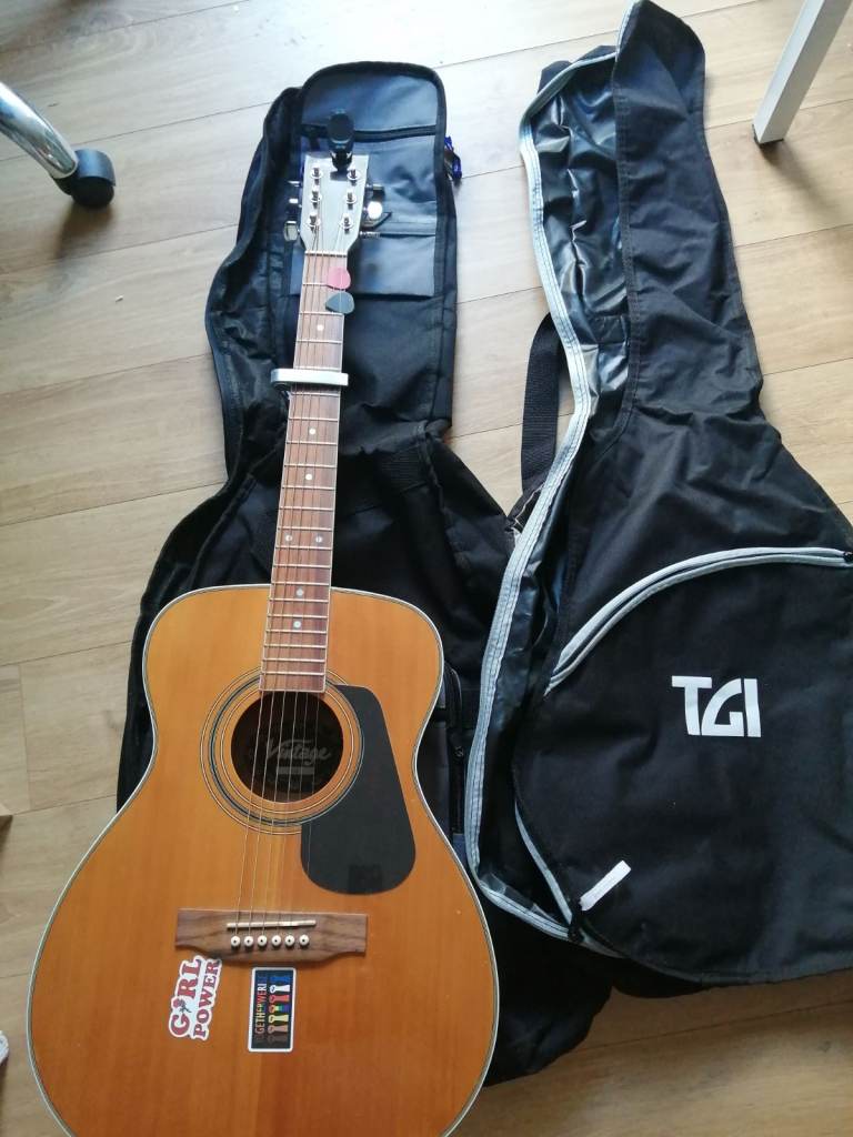 Acoustic guitar with accessories ** open the reasonable offers**