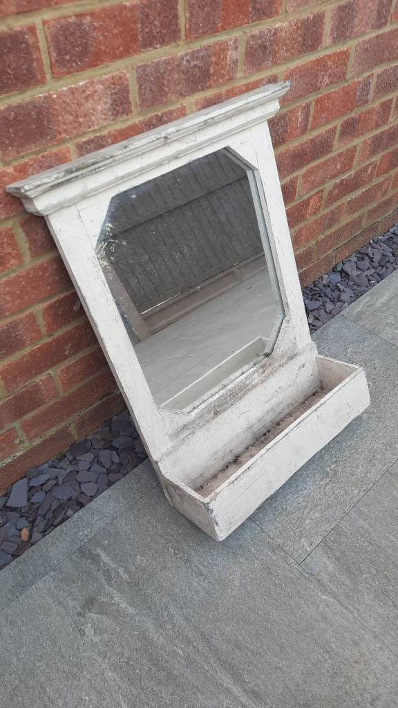 Mirror with tray