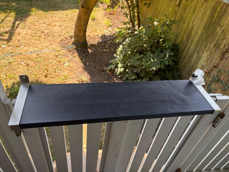 Black Wooden Shelf with Metal Brackets – Good Condition