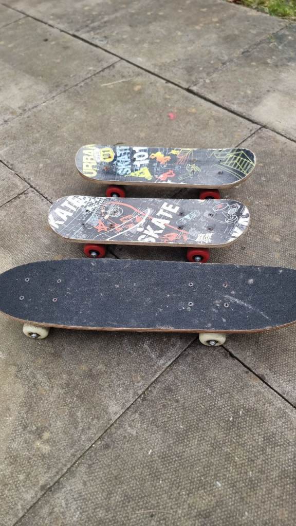 Three skateboards