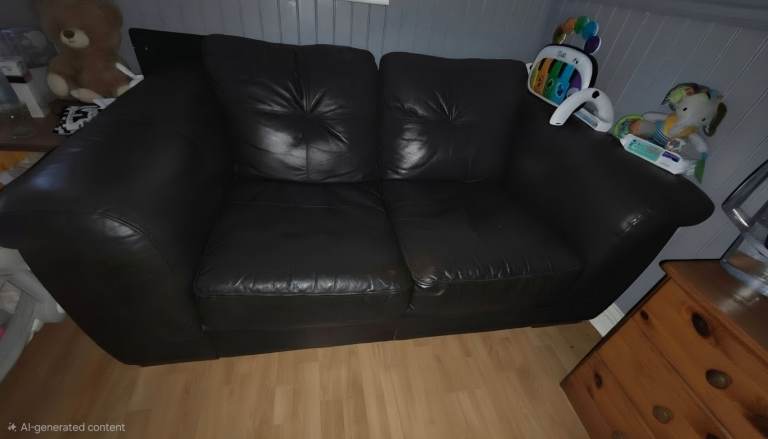Black Leather Two-Seater Sofa – Good Condition