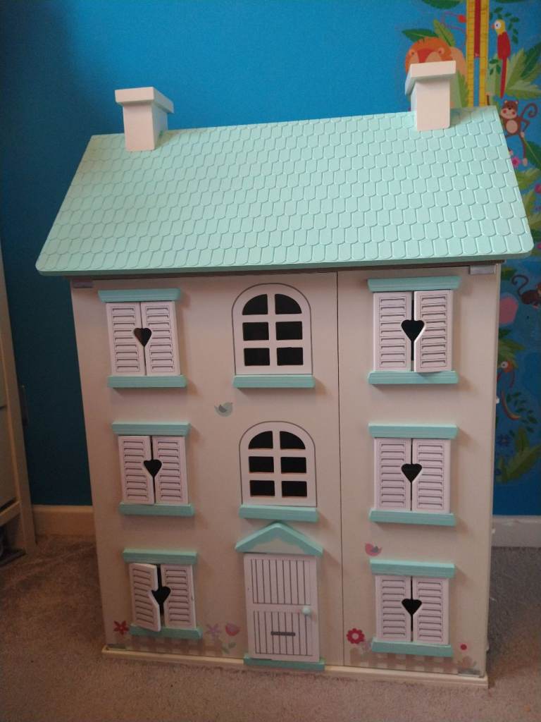 Wooden light up dolls house and furniture - great condition!