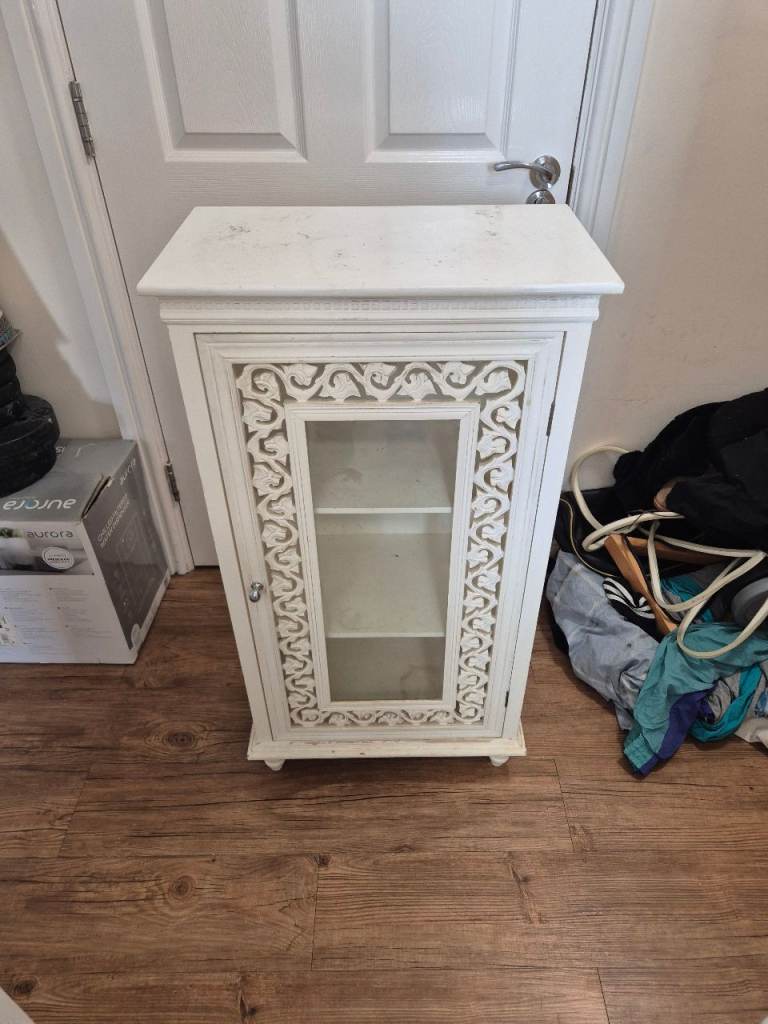 Small White Display Cabinet with Glass Door and Carved Detail