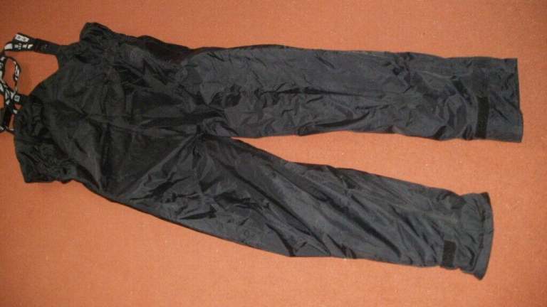 Belstaff over trousers.