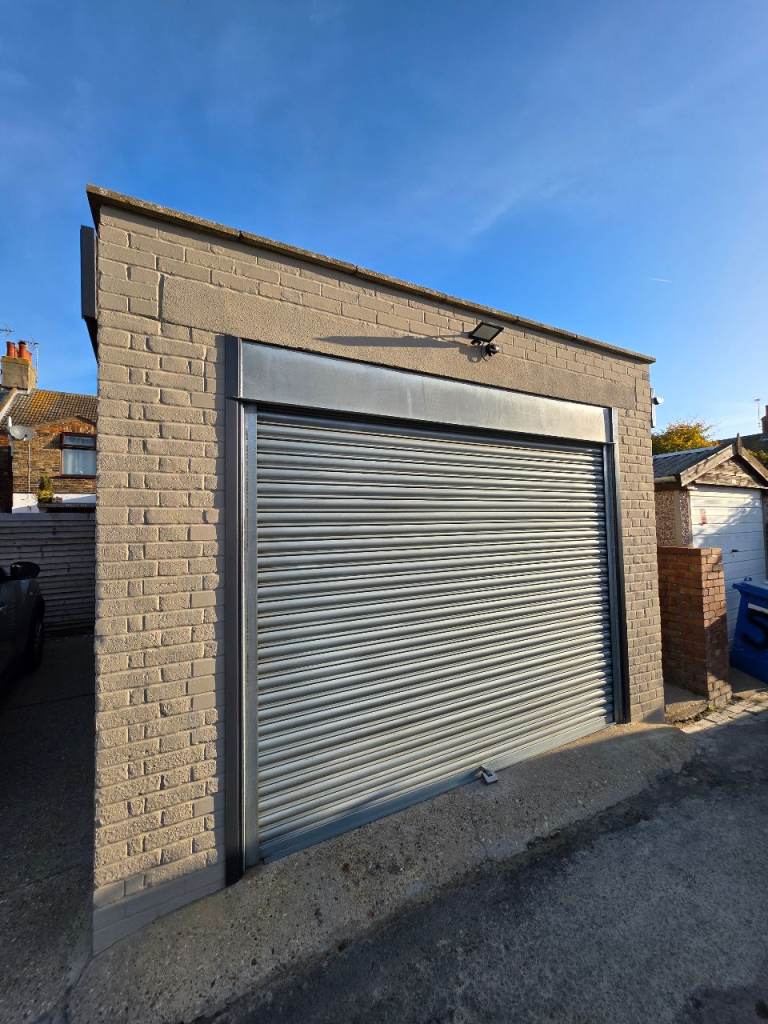 Large lock up garage/small workshop, own electricity supply, available from 1st October. 