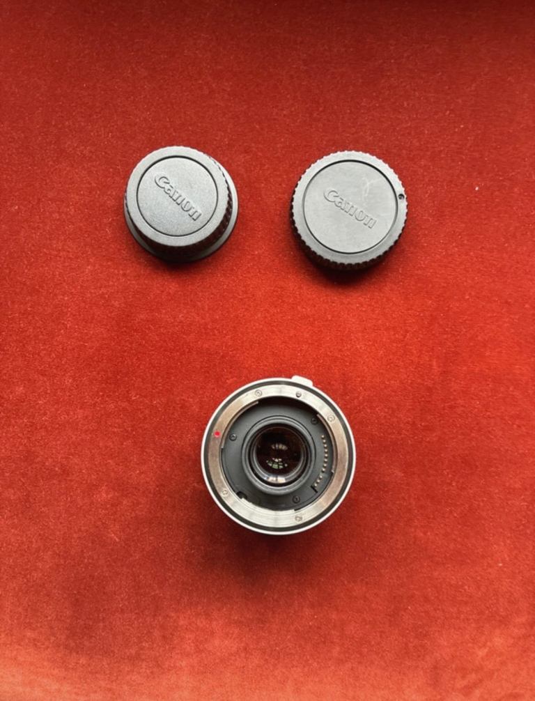 Canon Camera Lens with Caps and Pouch – Good Condition