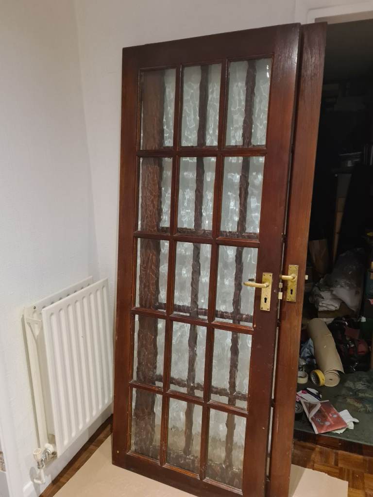 4 Wooden internal doors with glass panels. Nominally 78" x 30" 