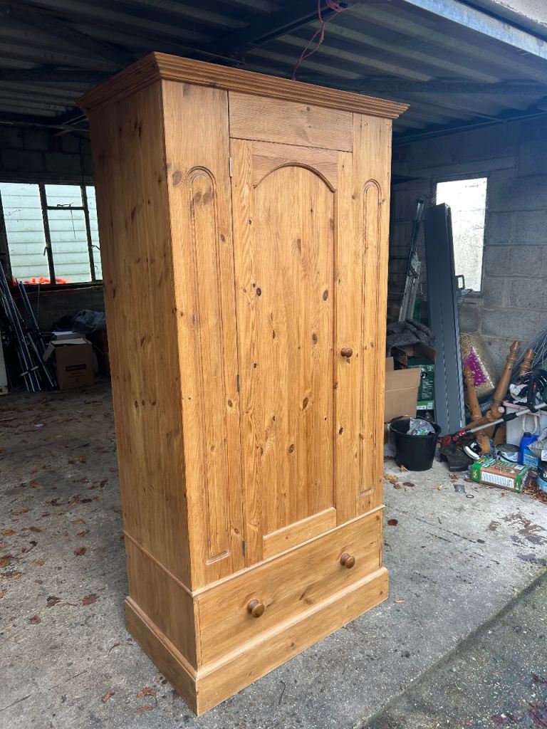 Solid chunky pine wardrobe with drawer. Possible delivery 