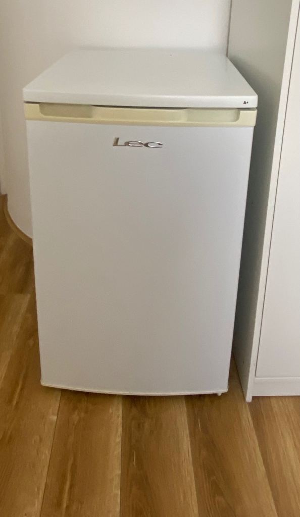 Lec fridge with a small freezer
