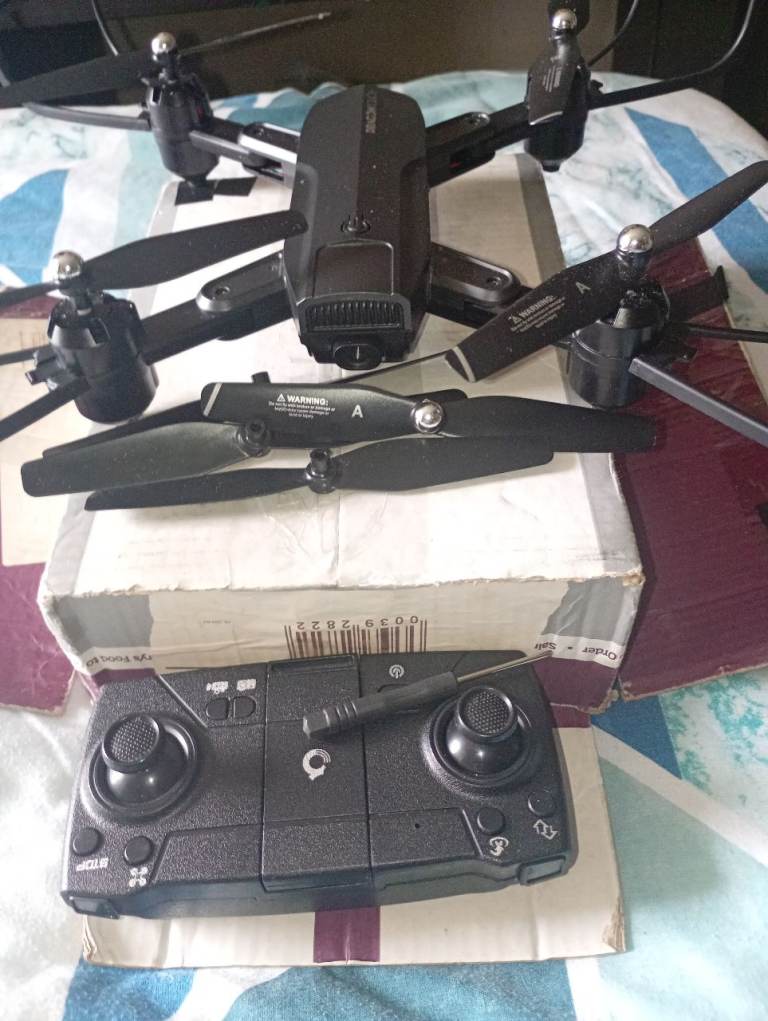 Black Drone with Controller – Good Condition