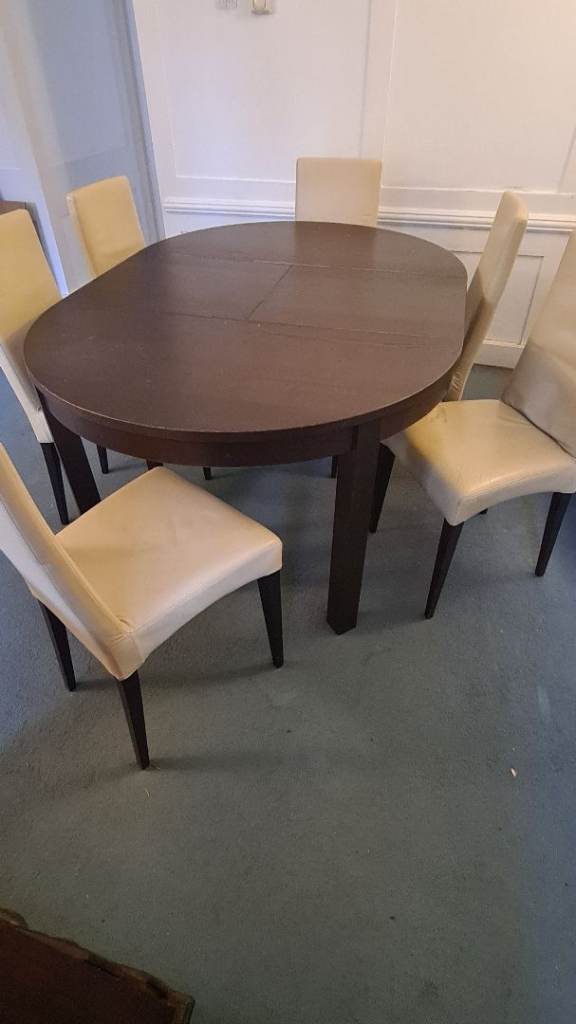 Extending table and 6 Italian leather chairs 