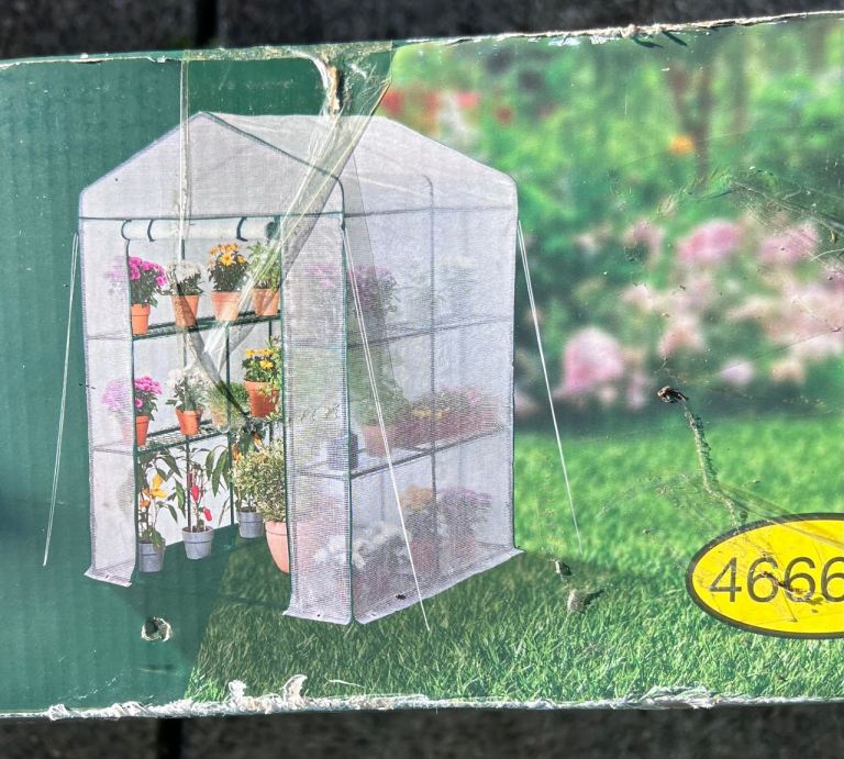 Unopened walk-in Greenhouse 