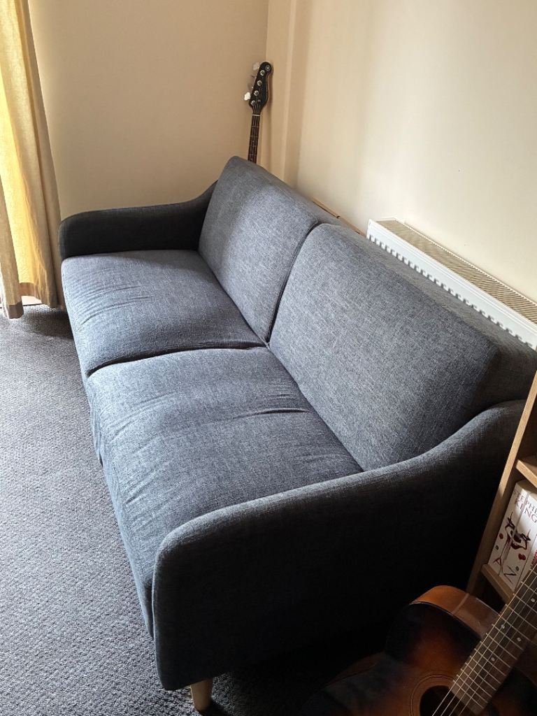 Comfortable Grey Two-Seater Sofa – Good Condition