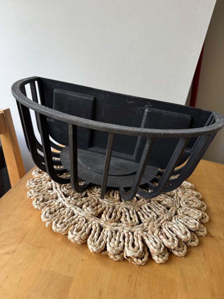 Black plastic (wrought iron effect) half moon wall hanging basket/planter