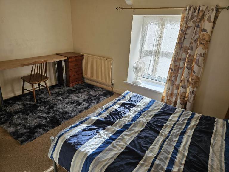 Large room in three-bedroom house
