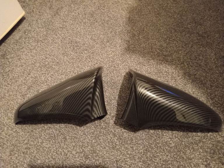 carbon fiber-style rearview side wing mirror cover caps. 