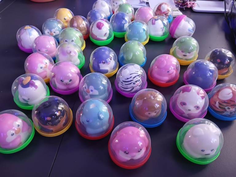 Collection of Small Animal Toys in Capsules – Good Condition