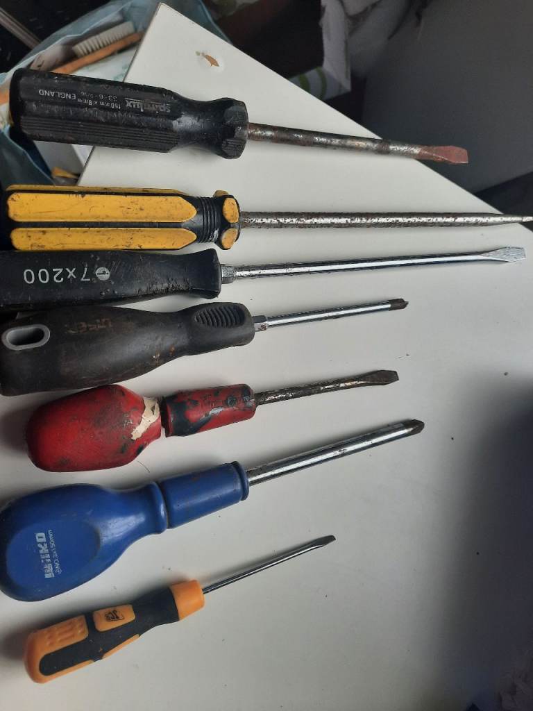 Screwdrivers, hammer,  spanner