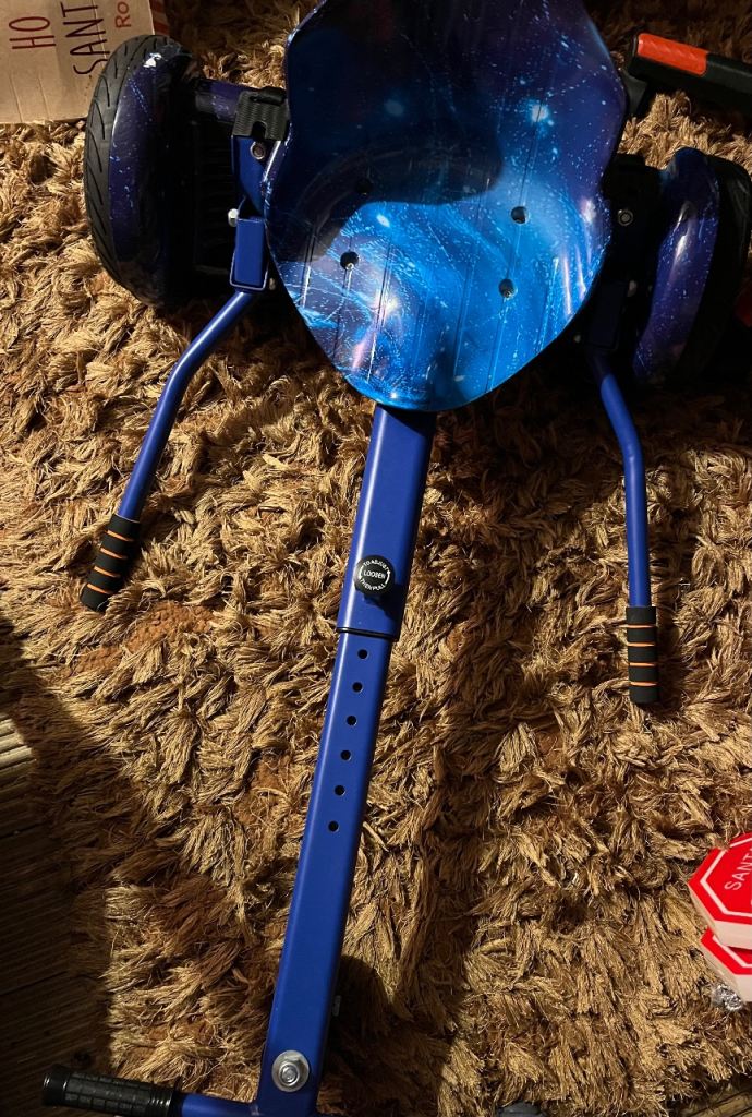 Blue hoverboard with kart 