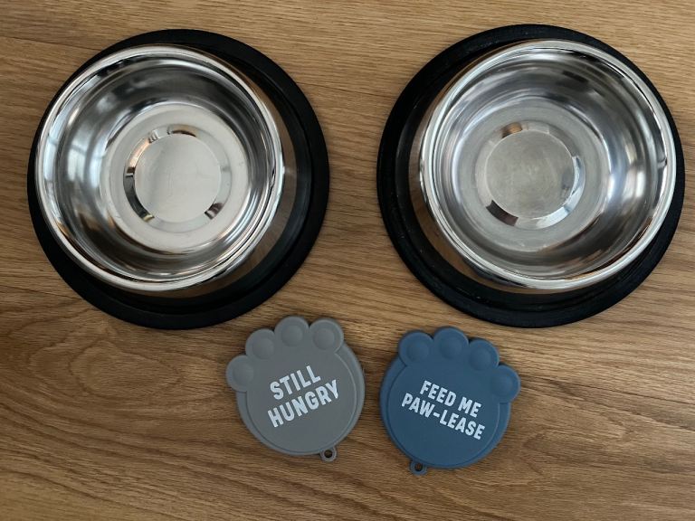 2 stainless steel dog food bowls and can covers 