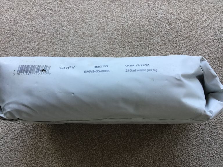 New Bag of GREY BATHROOM ADHESIVE FILLER