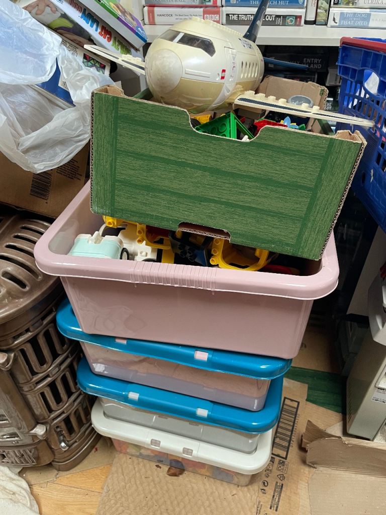 Five boxes of Duplo including a vintage aeroplane and some Disney Cars 
