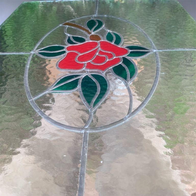 Two stained glass leaded window panes