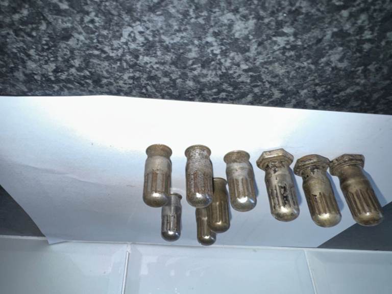 old pre war car tyre  valve caps