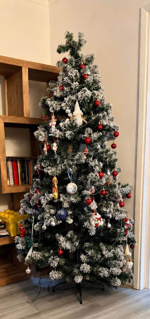 Christmas tree with decorations and stand
