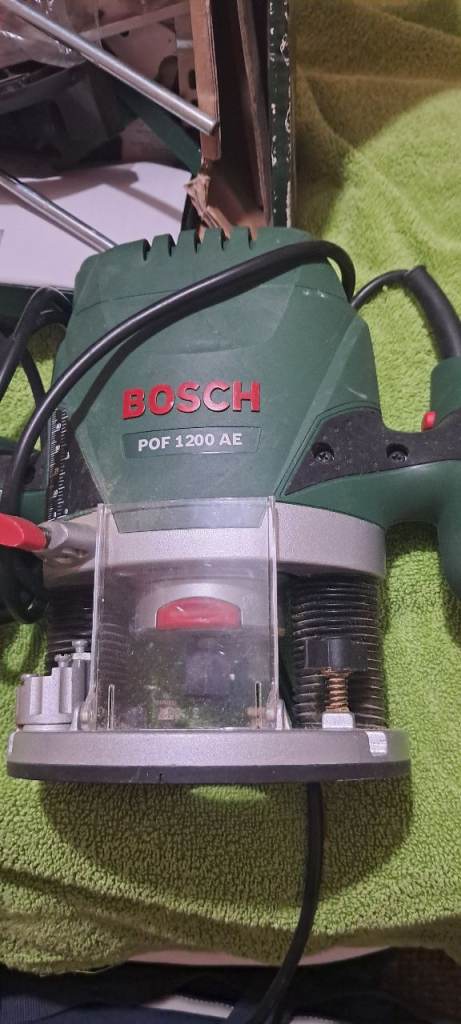 Bosch POF 1200 AE with bits etc.