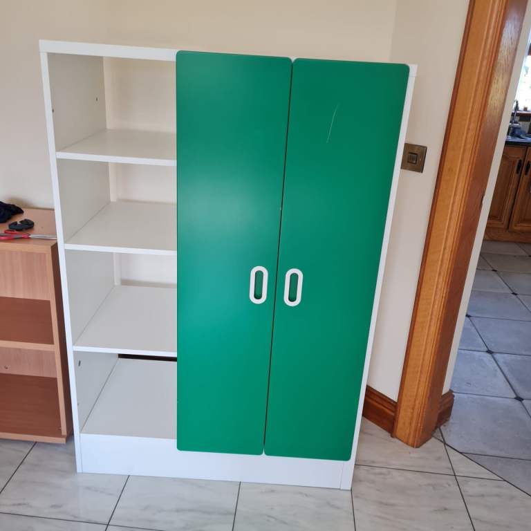 Childs wardrobe with adjoining shelving 