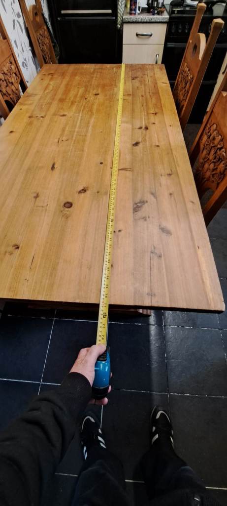 Wooden antique dining table and chairs