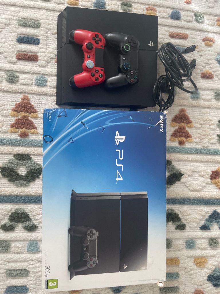 Sony PlayStation 4 500GB with Two Controllers – Good Condition