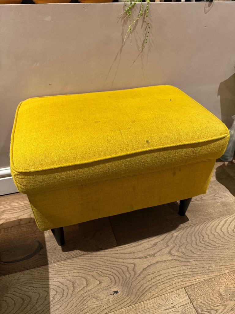 Ikea footstool in yellow