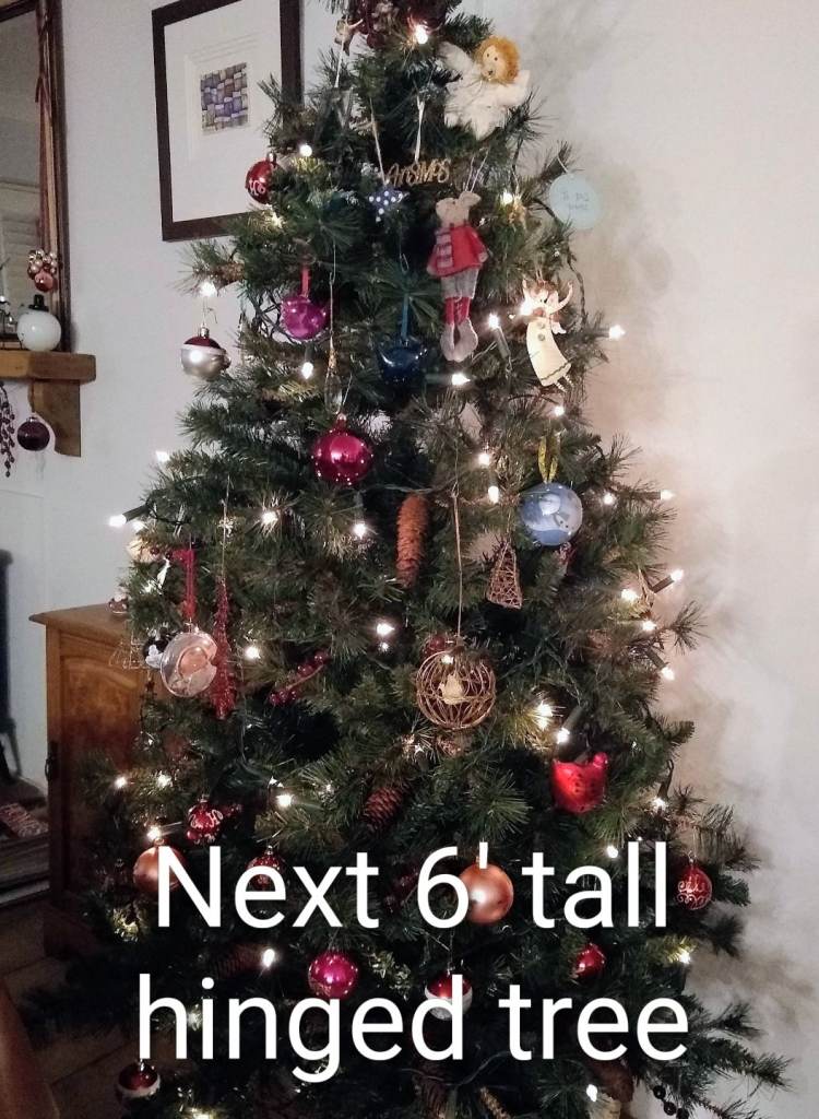 image for Next Christmas tree six foot tall hinged 