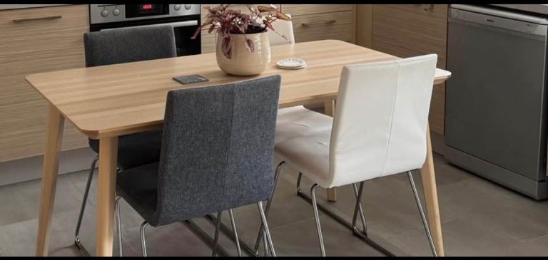 For sale - 4  modern classic cantilever design dining chairs. 