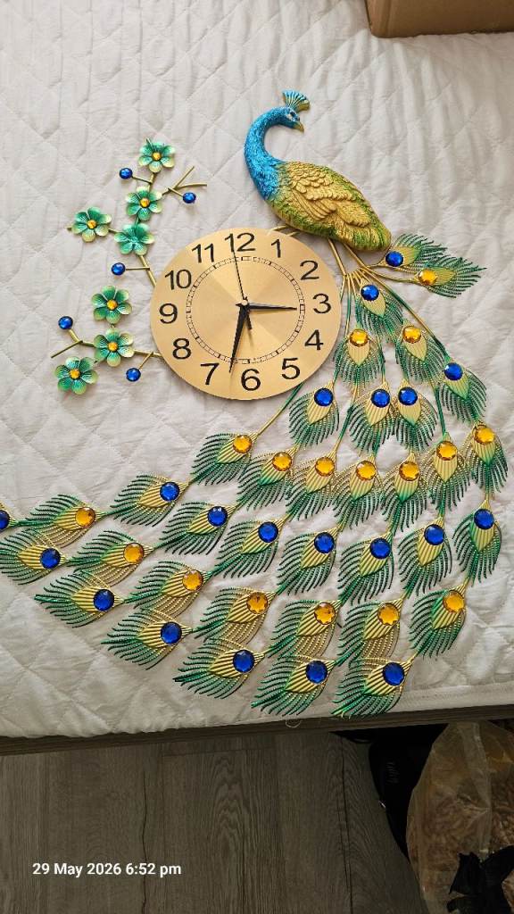 Peacock wall clock