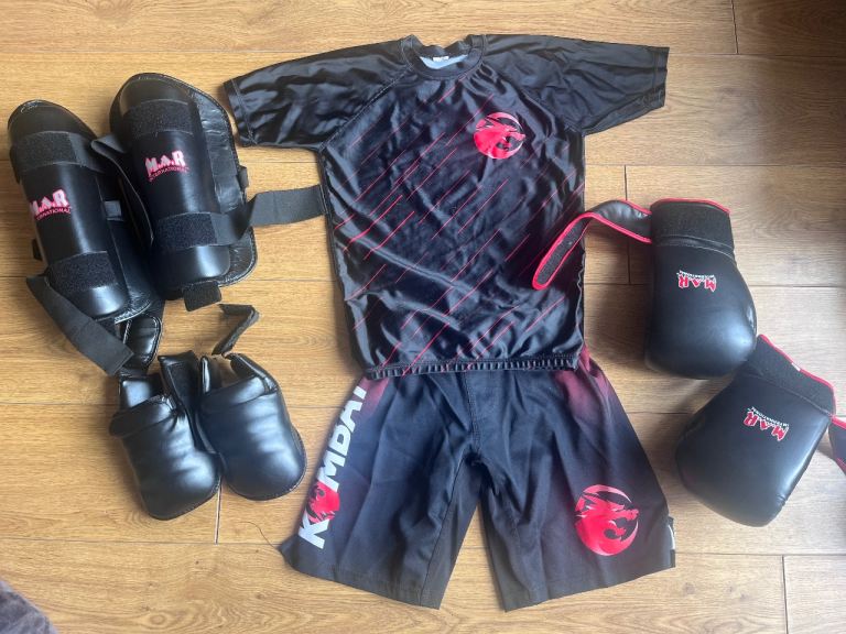 Martial arts clothing, boxing gloves, shin pads and foot guard protective equipment 