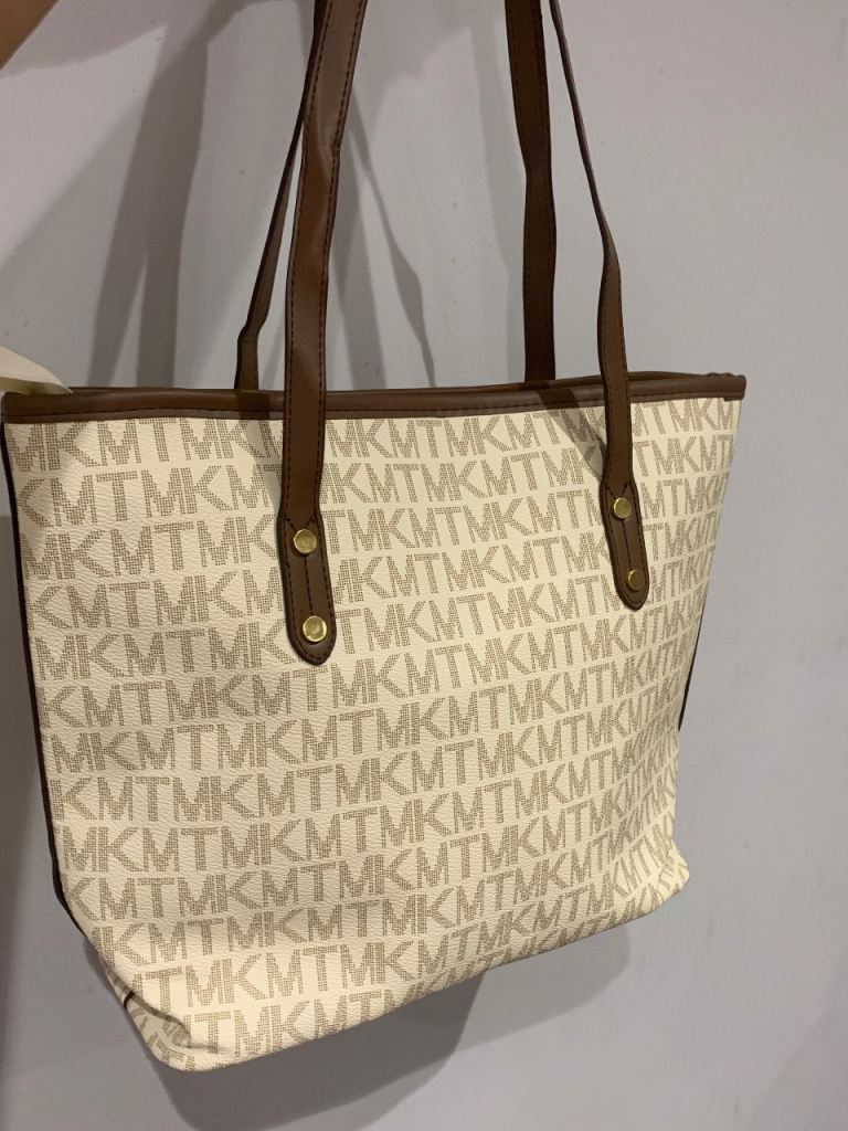 Stylish Beige Tote Bag with Brown Straps – Good Condition