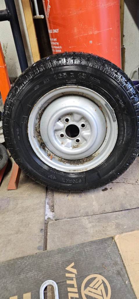 Wheel and new tyre 165/R/13