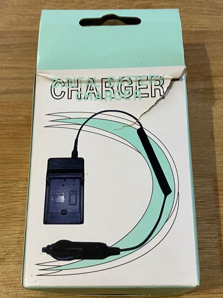 Universal Battery Charger for Camera / Camcorder Car Adapter
