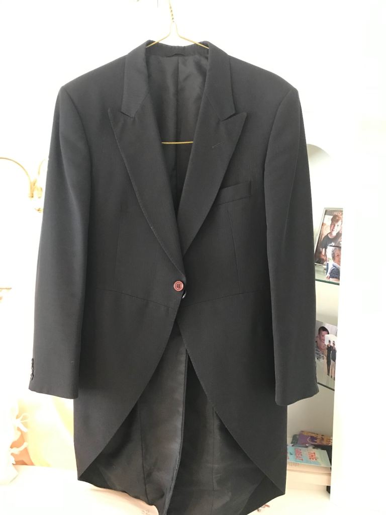 Black Tail coat, waistcoat and striped trousers