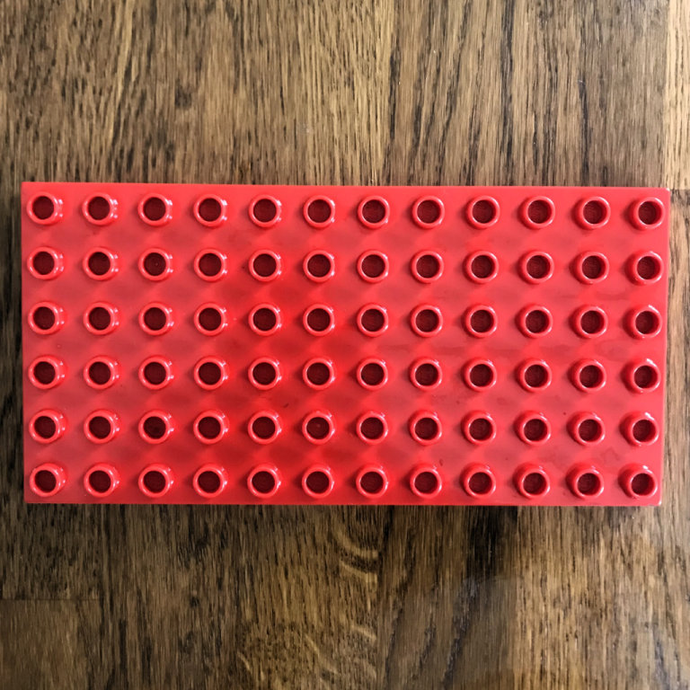 Vintge 1980's Lego Duplo red base board 12x6. £5 ovno. Can post.