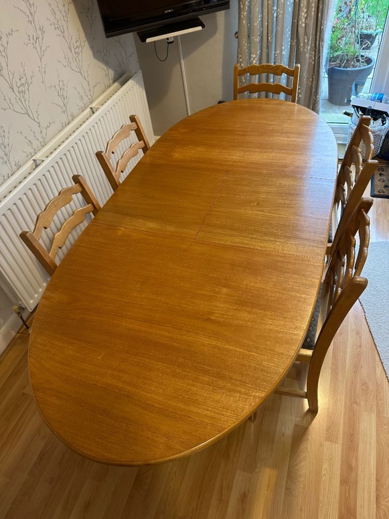 A lovely extendable Solid Wood Dining Table 