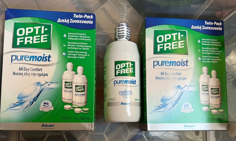 Brand new unopened contact lens Opticare fluid 