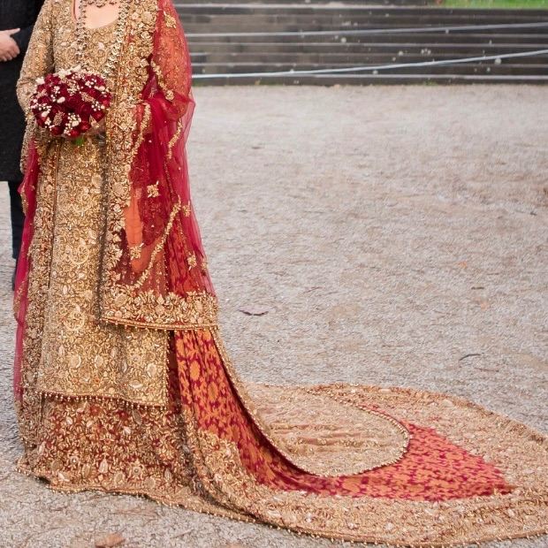 Gold and red Pakistani bridal dress 