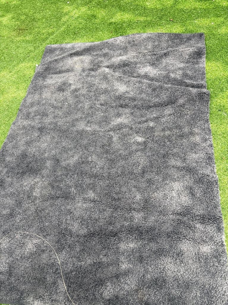 Dark grey rug 